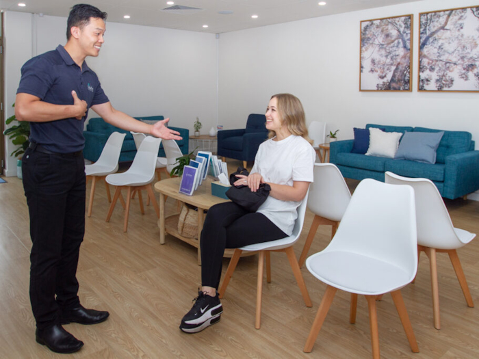 practitioner welcoming patient for acupuncture treatment