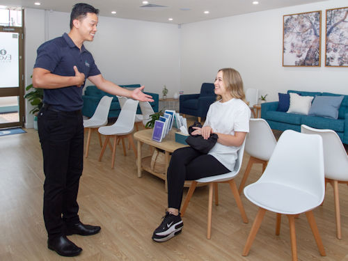 patient seeing practitioner for a consultation for acupuncture treatment for PCOS and Fertility