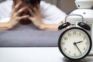 Person unable to sleep due to being in pain