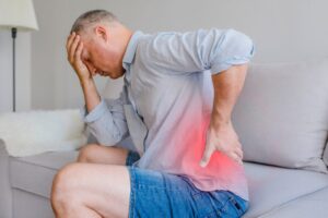 man dealing with chronic pain which is impacting his mental health