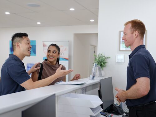 practitioners talking to client about their thyroid health and ways to improve thyroid function naturally