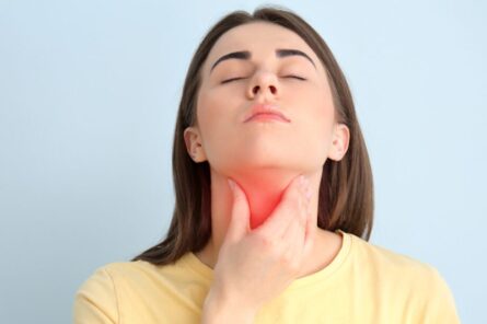 woman suffering with thyroid issues