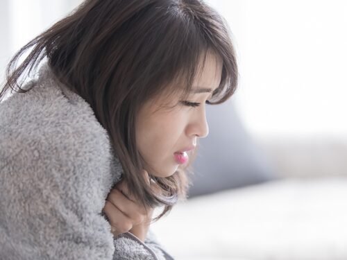 women cold in winter and in pain