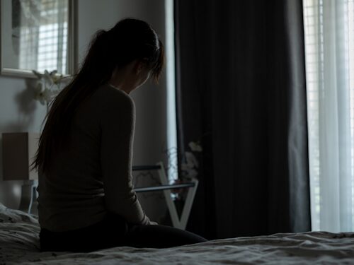 person experiencing seasonal affective disorder leading to depression and pain sensitivity