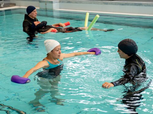 people using aquatic therapyas a gentle low impact excercise to support  joints with rheumatoid arthritis