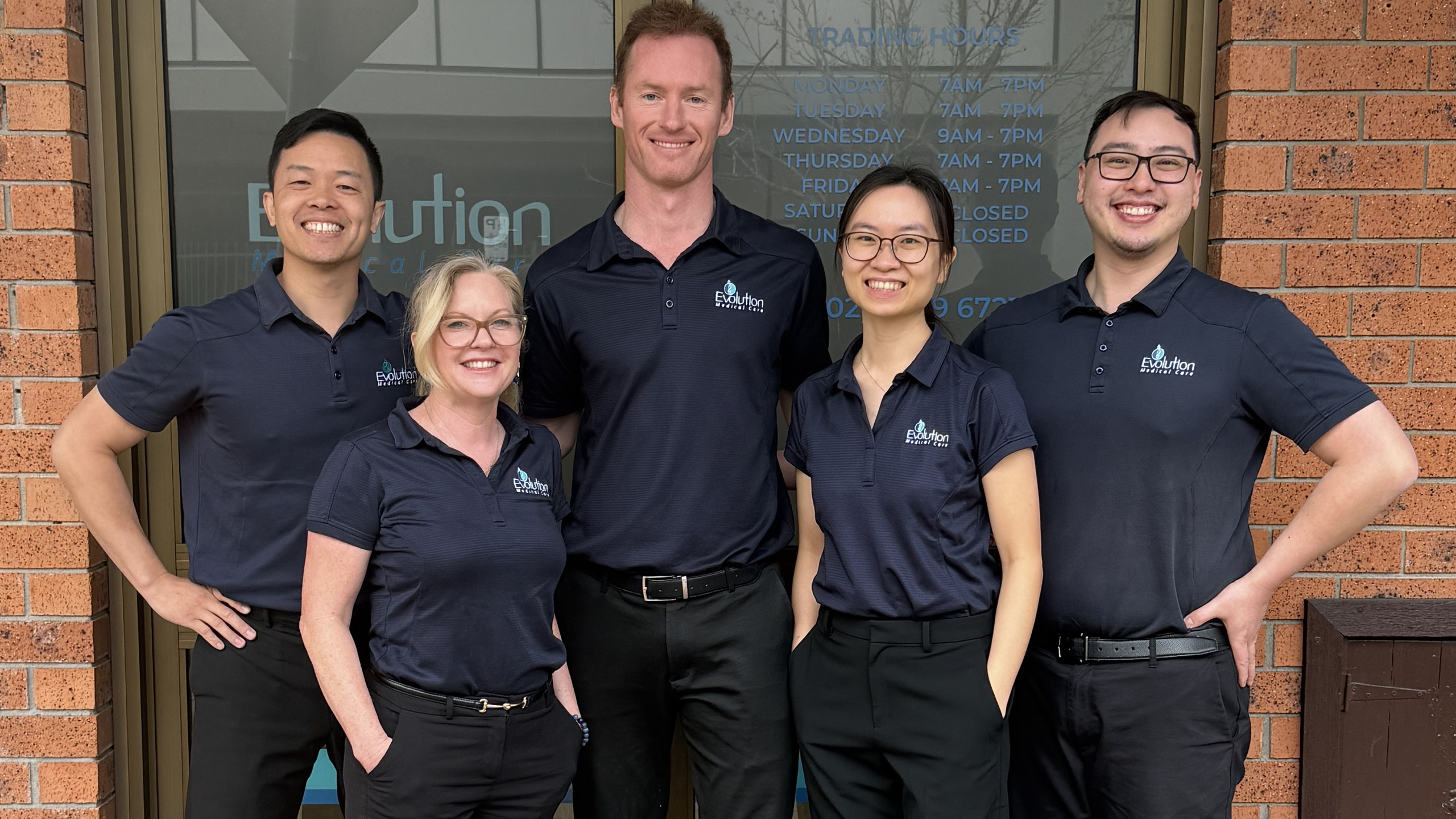 Evolution Medical Care team outside the clinic
