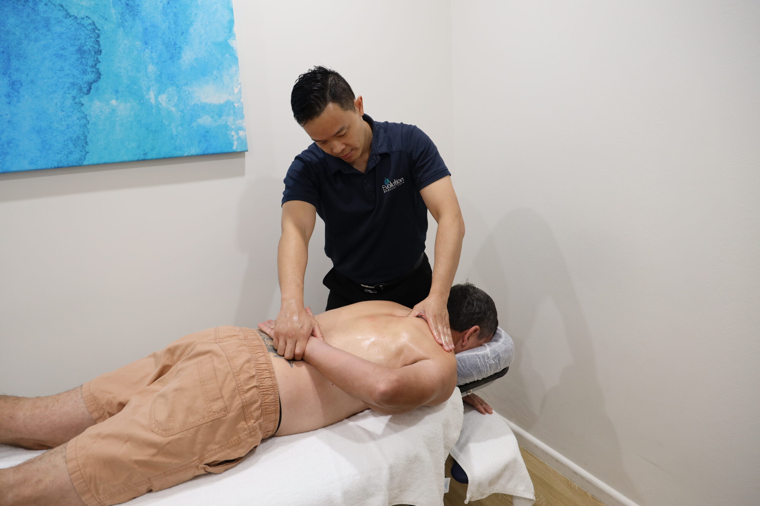 Remedial massage treatment for a workplace-related back injury