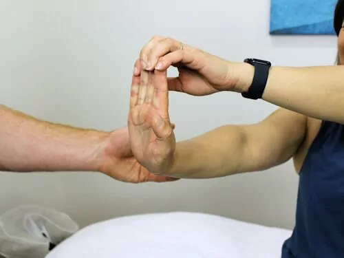 wrist flexor stretch exercise to relieve tennis elbow pain